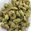 Gary Payton THCa Flower buds on a white background, showcasing dense, frosty nugs with a sweet, earthy aroma