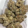 Sour Cherry Exotic THCa Flower with vibrant, resin-coated buds and a sweet, tangy aroma